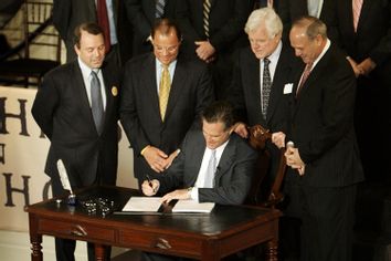 Massachusetts Governor Romney signs healthcare reform bill for Commonwealth of Massachusetts at Faneuil Hall in Boston