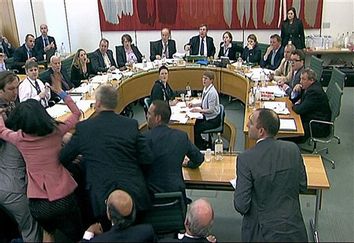 APTOPIX Britain Phone Hacking
