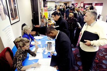 Job seekers attend the Minneapolis Career Fair