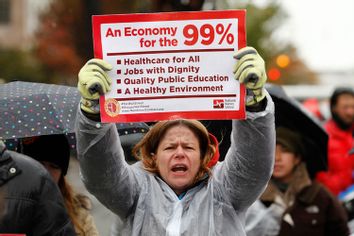 Occupy K Street demonstrators protest on a street in Washington