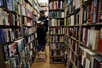 Meghan Hetfield searches the bookshelves at the Strand bookstore