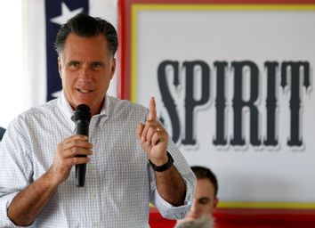 U.S. Republican Presidential candidate Mitt Romney speaks on a Mississippi river boat in Iowa