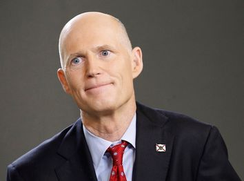 Florida Governor Scott speaks during an interview in New York