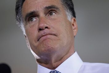 U.S. Republican presidential candidate Mitt Romney looks on at an election rally in Sterling