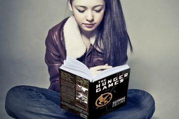 teen girl reads a book