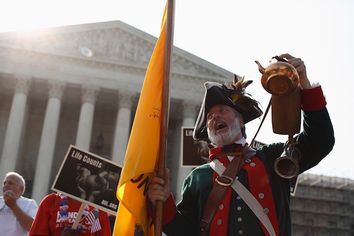 Tea party supporter Temple shouts against the health care overhaul outside the Supreme Court in Washington