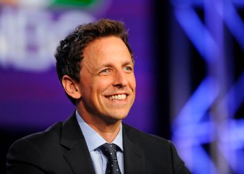 Host Seth Meyers takes part in a panel discussion about 