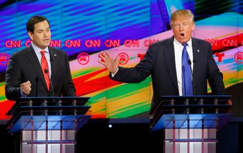 Republican U.S. presidential candidates Marco Rubio (L) and Donald Trump speak simultaneously at the debate sponsored by CNN for the 2016 Republican U.S. presidential candidates in Houston