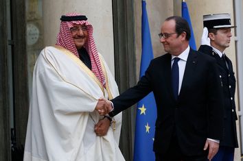 French President Francois Hollande welcomes Crown Prince Mohammed bin Nayef of Saudi Arabia at the Elysee Palace in Paris