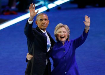 U.S. President Barack Obama is joined by Democratic Nominee for President Hillary Clinton on stage at the Democratic National Convention in Philadelphia