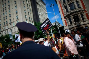 Demonstrators march during a protest in New York