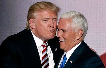 Republican U.S. presidential nominee Donald Trump greets vice presidential nominee Mike Pence after Pence spoke at the Republican National Convention in Cleveland