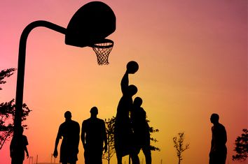 Sillouette of basketball players