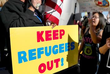 Protestors Rally Against Muslim Immigration Ban At LAX