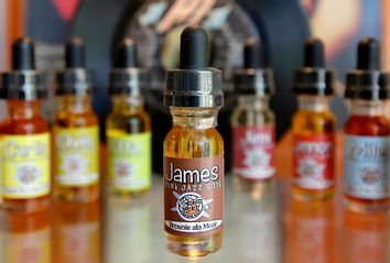 Bottles of various flavors of vapor solution