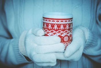 Woman Holding A Mug