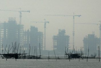 A haze cover the Jakarta bay skyline in