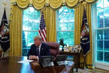 President Trump Speaks To Reporters In The Oval Office