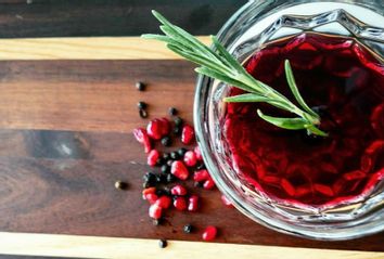 Spiced Pomegranate Bourbon Smash cocktail