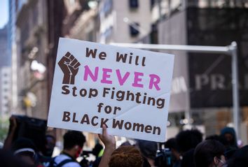 We Will NEVER Stop Fighting for BLACK Women sign
