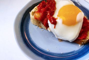 Eggs in purgatory on toast