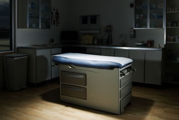 Empty doctor examination room