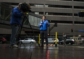 A local news team broadcasts outside the Hennepin County Government Center on April 8, 2021 in Minneapolis, Minnesota. 