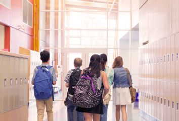 Students walking in corridor