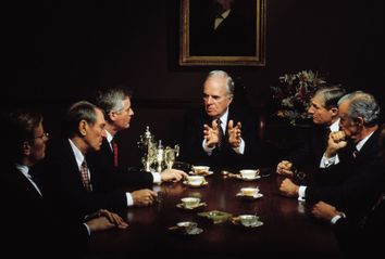 Rich old men in a meeting