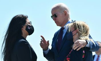 President Joe Biden speaks with Representative Rashida Tlaib