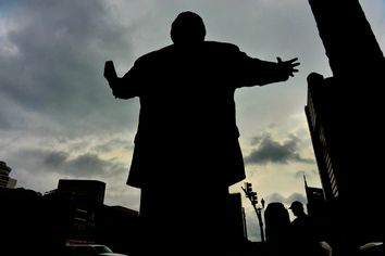 A 7-foot tall statue (with a 17-foot tall cross) of evangelist Billy Graham graces the front entrance to the headquarters of the Southern Baptist Convention in Nashville