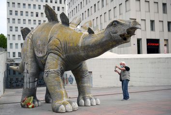 A large statue of a stegosaurus near Barcelona