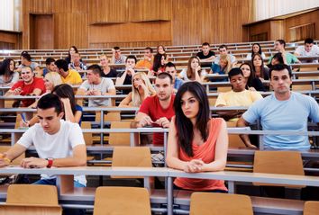 Large group of students at university lecture hall