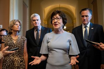 Sen. Susan Collins, center