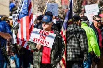 A protestor holds a placard saying Stop the steal during a demonstration in Nevada.