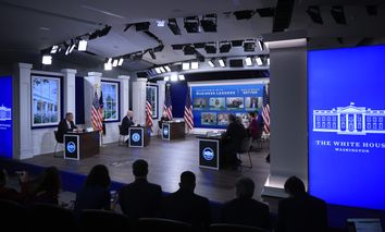 U.S. President Joe Biden (second from left) hosts a hybrid meeting with business leaders at the South Court Auditorium in the Eisenhower Executive Office Building on October 06, 2021.