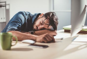 Man sleeping in office