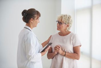 Doctor delivering news to patient