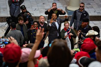 From right: Vernon Jones, Democratic Party member of the Georgia House of Representatives along with and conspiracy theorist Alex Jones and Ali Alexander, organizer for Stop the Steal, gather at the Georgia Capitol Building on Wednesday, Nov. 18, 2020 in Atlanta, Georgia.