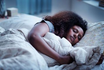 Woman sleeping in bed