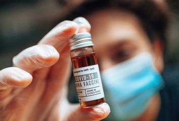 Pharmacist holding the Covid19 vaccine vial