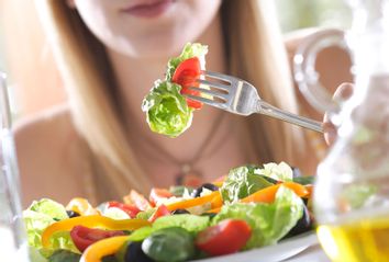 Woman eating a salad