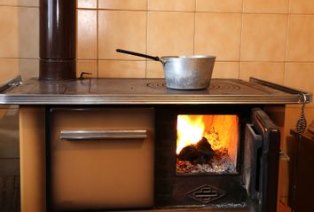 Old wood-burning stove in the kitchen of home