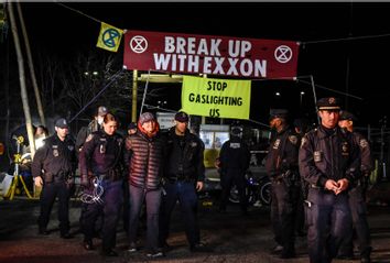 Activists block printing plant