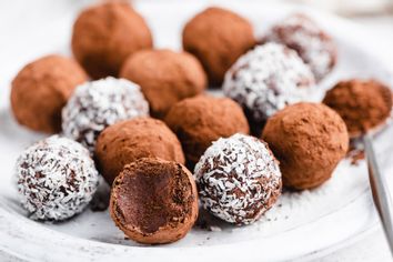 Homemade chocolate truffles with cocoa and coconut