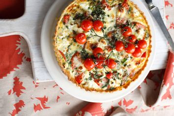 Tomato and red pepper tart with garnish