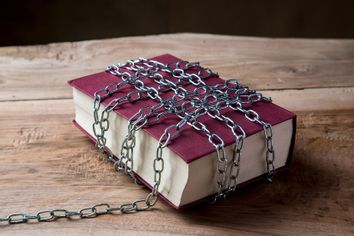 Book with chains wrapped around it