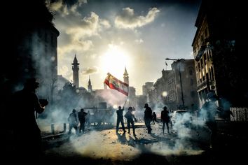 Anti-government protesters take part in a demonstration against the political elites and the government, in Beirut, Lebanon