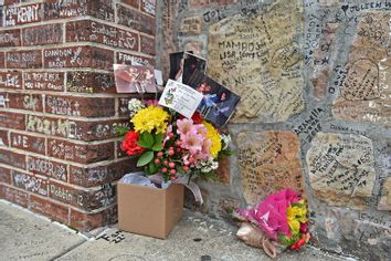 Flowers left by fans outside Graceland to pay respects to Lisa Marie Presley