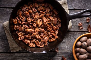 Fresh Glazed Pecans in a Cast Iron Skillet